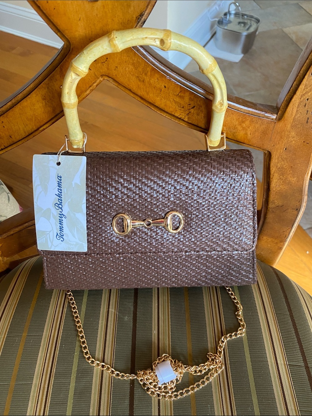 NWT Tommy Bahama straw bag with handle and gold chain crossbody strap.